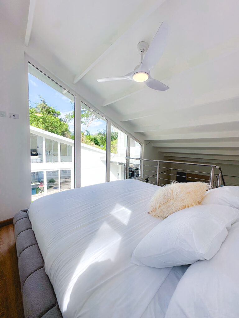 The panoramic windows connect you with the outdoors, allowing the majestic beauty of Playa Hermosa 
