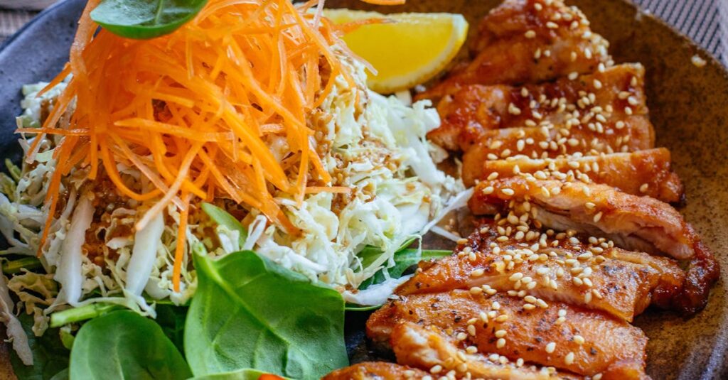 Vibrant Asian salad with grilled chicken, perfect for healthy eating enthusiasts.