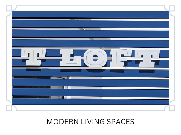 Modern Living Spaces The main access to T Loft is marked by a blue designer door featuring the brand's distinctive white logo, reflecting its modern living spaces concept.