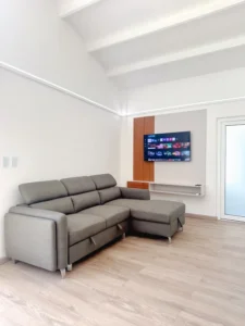 Cozy space designed for comfort, equipped with a versatile sofa bed ideal for additional guests.