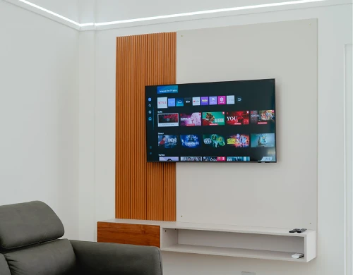 4K screen with integrated streaming apps and high-speed connection throughout the property.